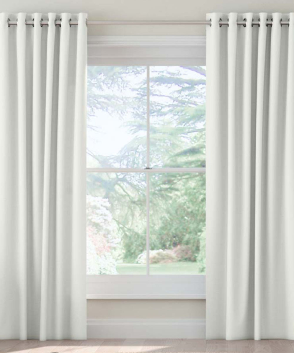 Drape curtains on a window