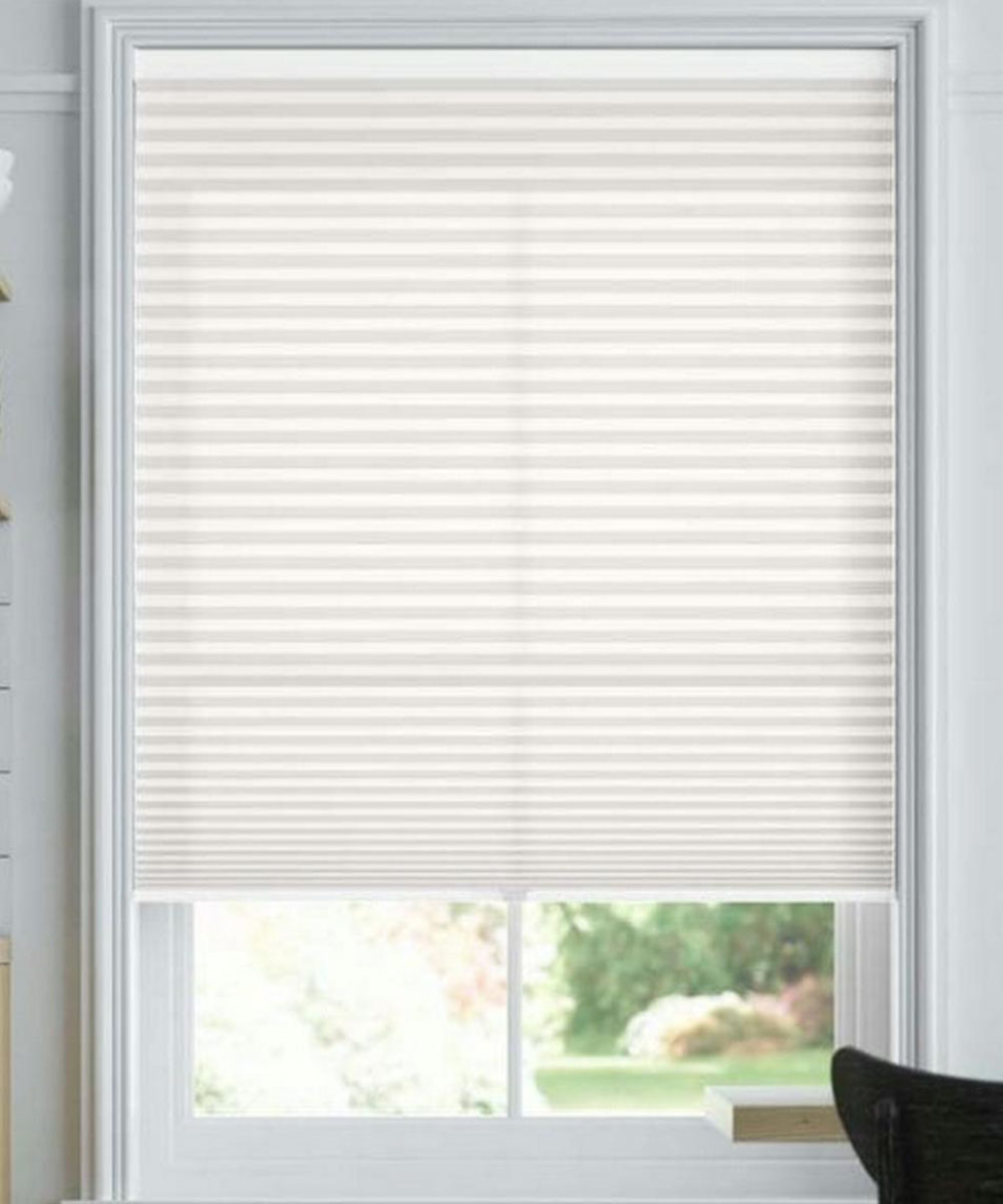 Honeycomb blinds covering a window